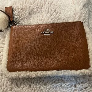 Coach leather wristlet with Sherpa trimming